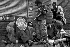 Colombia, Bogota, 2002 - 2009"Calle del Cartucho".Gods and Devils.Excessively moralistic and prone to inducing feelings of guilt, the Catholic religion's role is important in Colombia. The man hiding behind this portrait of the Christ humorously asks me to take a picture of him in his best light.Colombie, Bogota, 2002 - 2009"Calle del Cartucho".Dieux et Diables.Moraliste et culpabilisatrice ‡ outrance, la religion catholique a beaucoup de poids en Colombie. L'homme qui se cache derriËre le portrait du Christ, me demande avec humour, de le photographier sous son meilleur jour.Stanislas Guigui / Agence VU Colombia, Bogota, 2002 - 2009"Calle del Cartucho".Gods and Devils.Excessively moralistic and prone to inducing feelings of guilt, the Catholic religion's role is important in Colombia. The man hiding behind this portrait of the Christ humorously asks me to take a picture of him in his best light.Colombie, Bogota, 2002 - 2009"Calle del Cartucho".Dieux et Diables.Moraliste et culpabilisatrice ‡ outrance, la religion catholique a beaucoup de poids en Colombie. L'homme qui se cache derriËre le portrait du Christ, me demande avec humour, de le photographier sous son meilleur jour.Stanislas Guigui / Agence VU