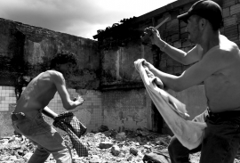 Colombia, Bogota, 2002 - 2009"Calle del Cartucho".Knife fights.Debts of honour o debts of money, the knife duel is a Neros tradition. The shirts they are holding, called Muleta, are used as a protection againt the opponent's blows. The fights are very impressive but often end when blood is drawn.Colombie, Bogota, 2002 - 2009"Calle del Cartucho".Combats au couteau.Dettes d'honneur ou d'argent, le duel au couteau est une tradition des Neros. Les chemises appelÈes Muleta qu'ils tiennent, servent ‡ se protÈger des coups de l'adversaire. Les combats sont trËs impressionnants, mais s'arrÍtent souvent au premier sang versÈ. Stanislas Guigui / Agence VU Colombia, Bogota, 2002 - 2009"Calle del Cartucho".Knife fights.Debts of honour o debts of money, the knife duel is a Neros tradition. The shirts they are holding, called Muleta, are used as a protection againt the opponent's blows. The fights are very impressive but often end when blood is drawn.Colombie, Bogota, 2002 - 2009"Calle del Cartucho".Combats au couteau.Dettes d'honneur ou d'argent, le duel au couteau est une tradition des Neros. Les chemises appelÈes Muleta qu'ils tiennent, servent ‡ se protÈger des coups de l'adversaire. Les combats sont trËs impressionnants, mais s'arrÍtent souvent au premier sang versÈ. Stanislas Guigui / Agence VU