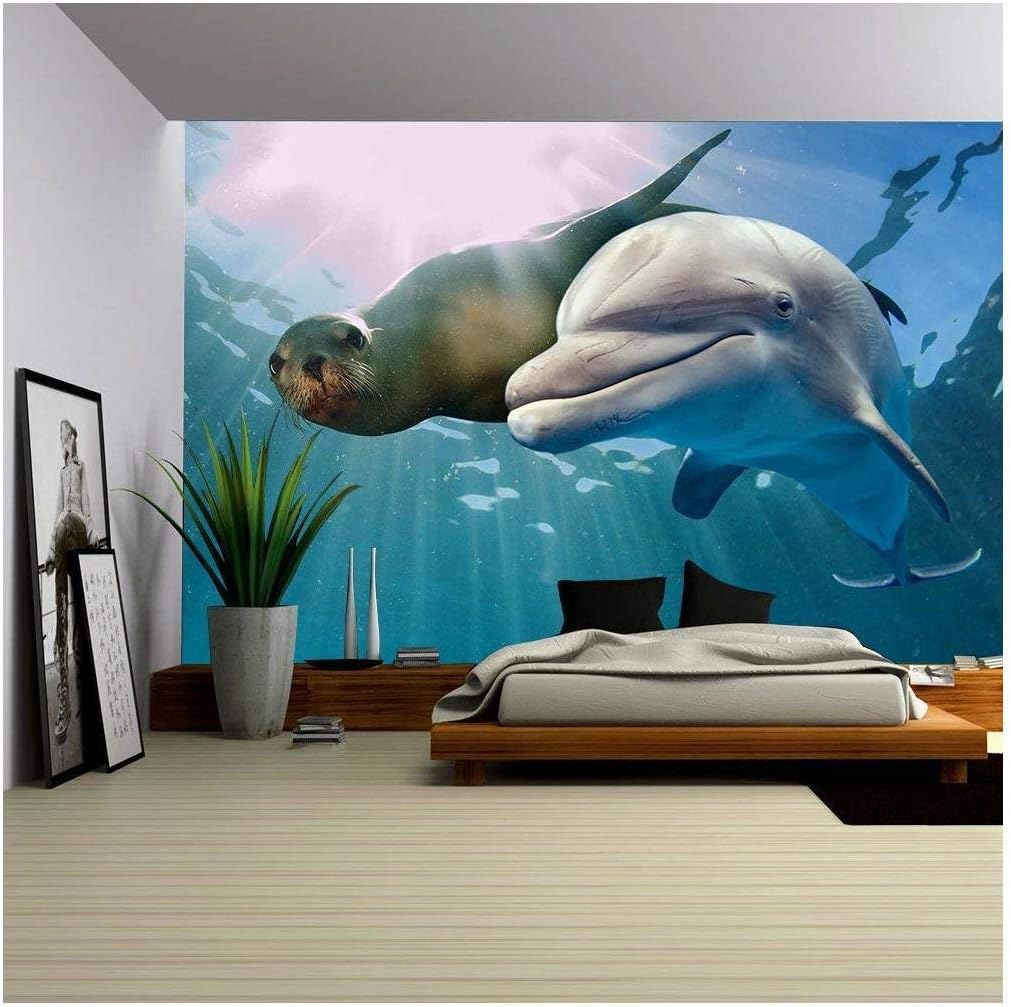 wall26 - Dolphin and Sea Lion Underwater on Ocean Background Looking at You - Removable Wall Mural | Self-Adhesive Large Wallpaper - 66x96 inches